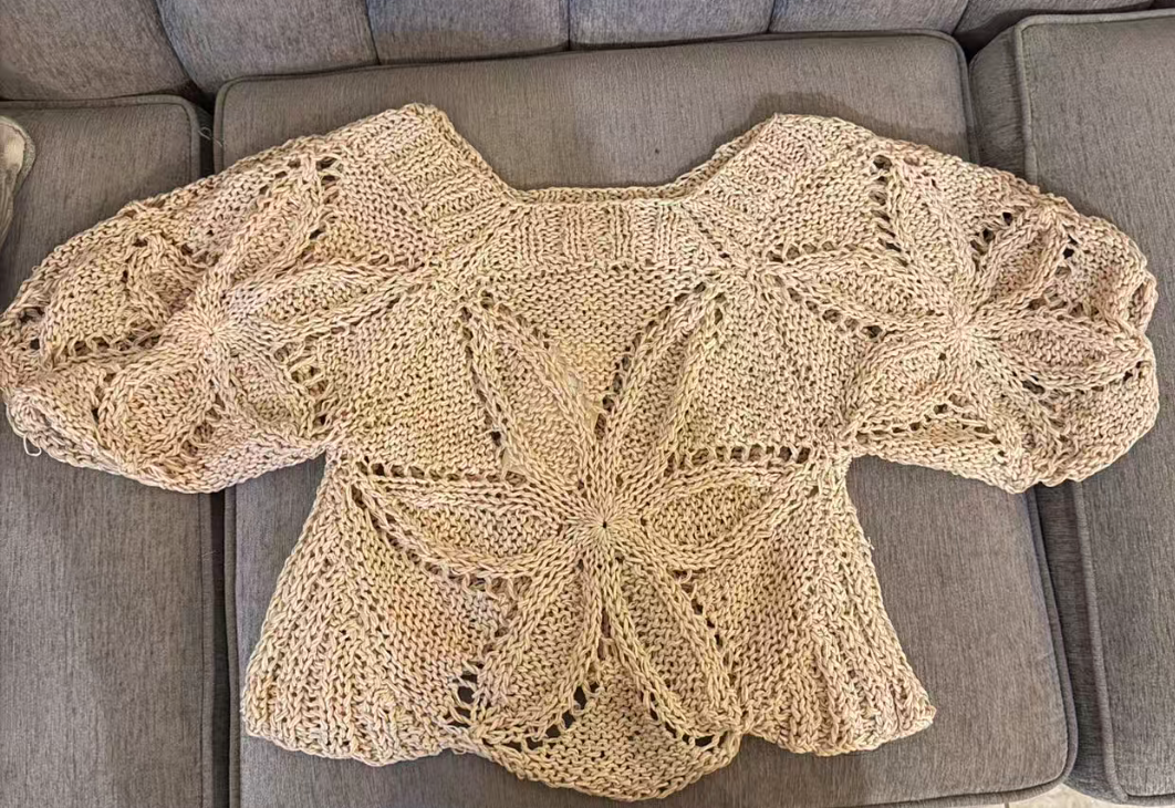 hand-knitted sweater made from 100% cotton ribbon yarn