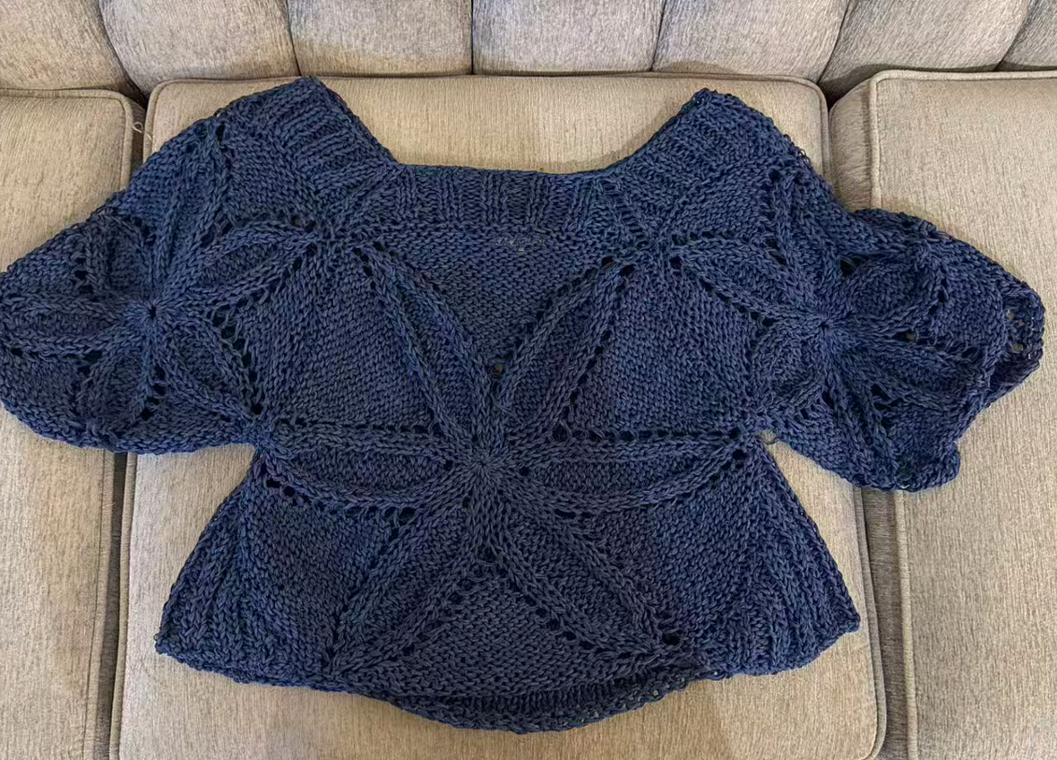 hand-knitted sweater made from 100% cotton ribbon yarn