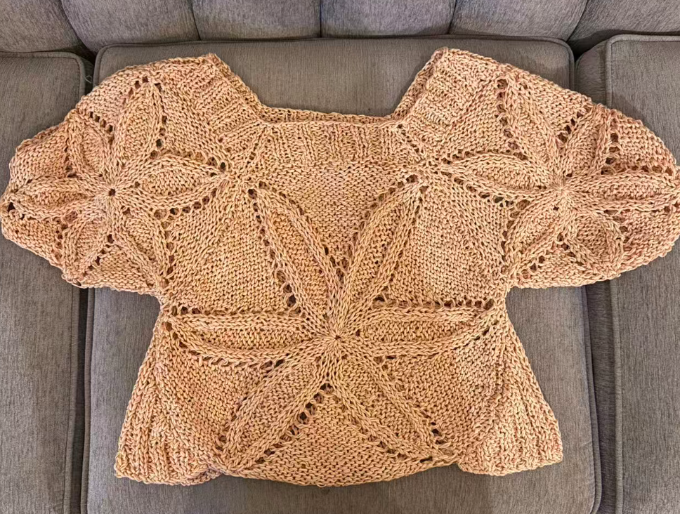 hand-knitted sweater made from 100% cotton ribbon yarn